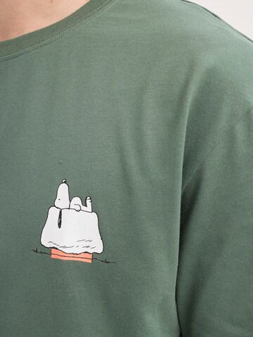 hydroponic - Camiseta 'Hydroponic x Peanuts Regular-Fit Long-Sleeve Ski Lift T-Shirt' en verde