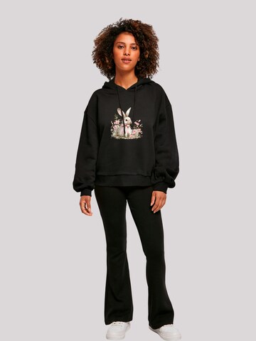 F4NT4STIC Sweatshirt 'Niedlicher Osterhase Mit Blumen' in Zwart