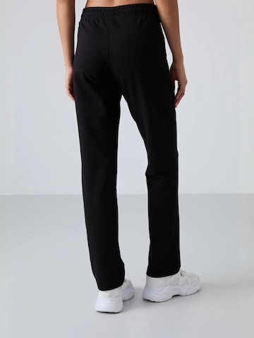 Regular Pantalon Tommy Life en noir