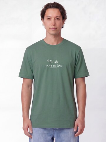 Maglietta 'Es Ist Wie Es Ist' di Watapparel in verde: frontale