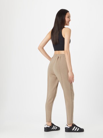 Athlecia Skinny Workout Pants 'Jacey' in Brown