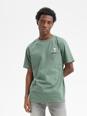 hydroponic - Camiseta 'Hydroponic x Peanuts Regular-Fit Short-Sleeve Campfire T-Shirt' en verde: frente