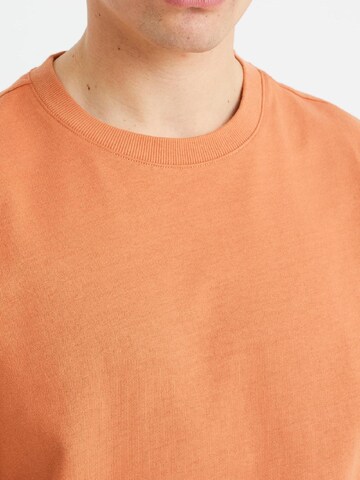 T-Shirt WE Fashion en orange