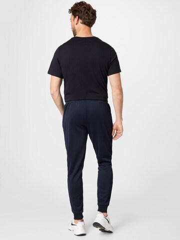 ELLESSE Tapered Pants 'Bertoni' in Blue