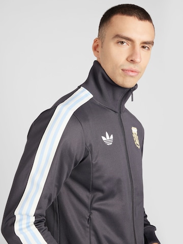 ADIDAS ORIGINALS - Sudadera con cremallera en gris