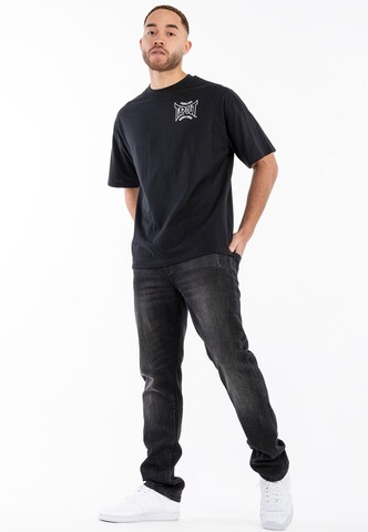 Tapout Koszulka 'B3Li3Ve' w kolorze czarny
