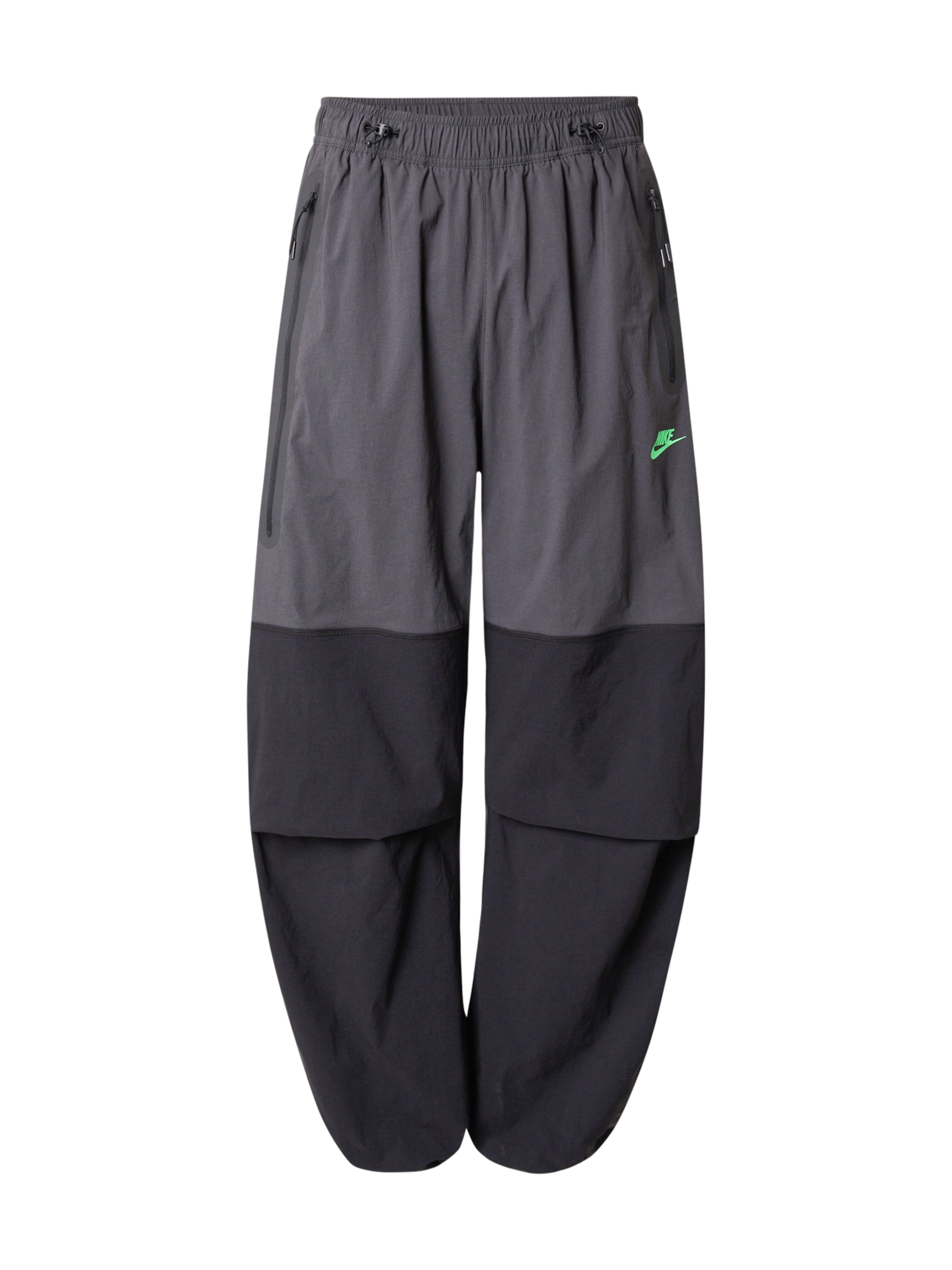 Nike Sportswear - Folgado Calças 'Tech' em cinzento: frente