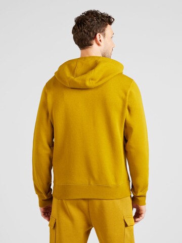Nike Sportswear Regular Fit Collegetakki 'CLUB FLEECE' värissä keltainen
