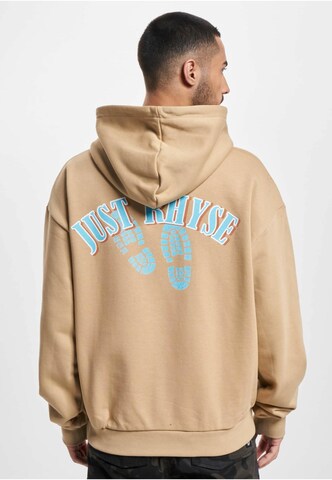 Sweat-shirt 'Go Further' Just Rhyse en beige : devant