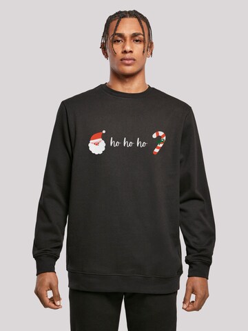 Sweat-shirt 'Ho Ho Ho Weihnachten Christmas' F4NT4STIC en noir : devant