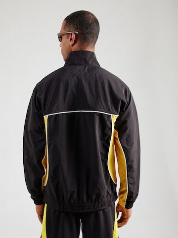 PUMA - Chaqueta deportiva 'BVB FtblStatement Cellerat' en negro
