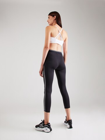 Reebok Skinny Workout Pants in Black