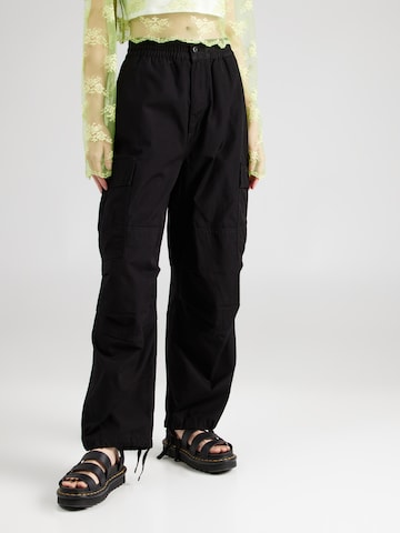 Carhartt WIP Loose fit Cargo trousers in Black: front