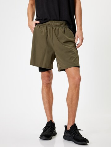 Koton Regular Broek in Groen: voorkant