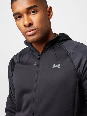 UNDER ARMOUR - Sudadera con cremallera deportiva en negro