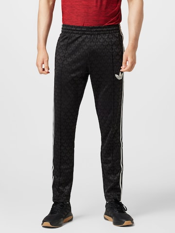 ADIDAS ORIGINALS Regular Broek 'Adicolor 70S Monogram' in Zwart: voorkant