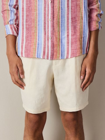 regular Pantaloni con pieghe di Next in beige: frontale