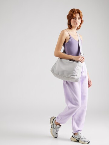 Nike Sportswear Tapered Trousers 'Phoenix Fleece' in Purple