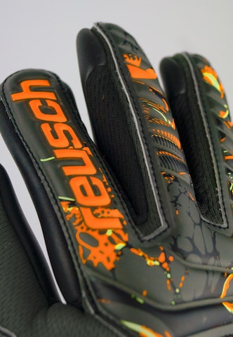 REUSCH Sporthandschuhe 'Attrakt Gold X Finger Support' in Schwarz