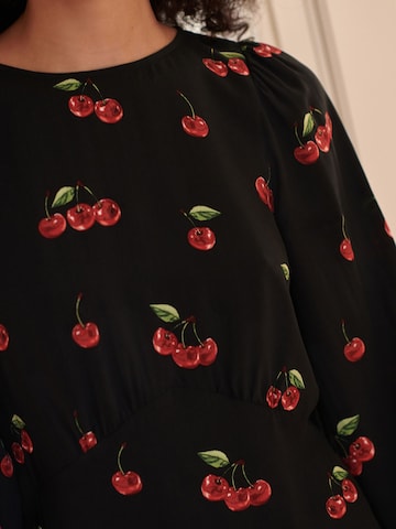 Robe Next en noir