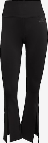 ADIDAS SPORTSWEAR Flared Workout Pants in Black: front
