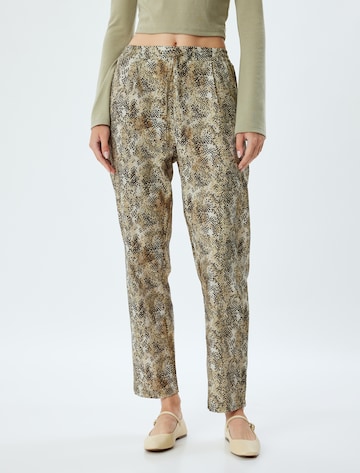 Koton Tapered Broek in Groen: voorkant