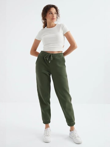 Regular Pantalon de sport Tommy Life en vert