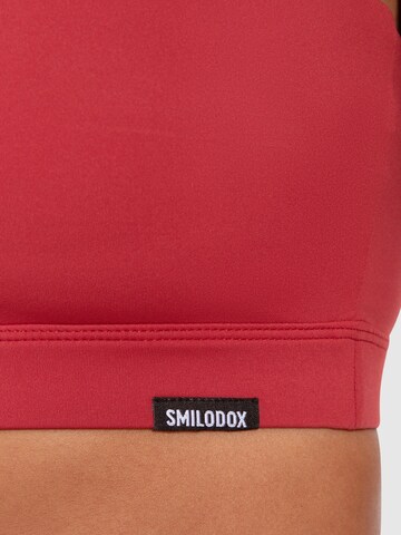 Haut de sport Smilodox en rouge