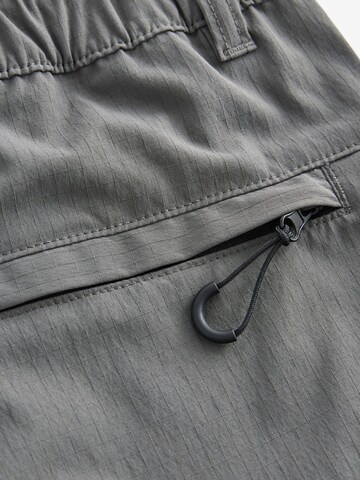 regular Pantaloni di Next in grigio