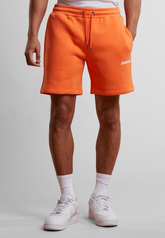 Regular Pantalon de sport Starter Black Label en orange : devant