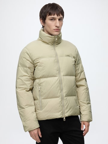 Geacă de iarnă de la Calvin Klein pe verde: față