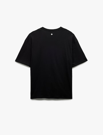 Koton T-Shirt in Schwarz