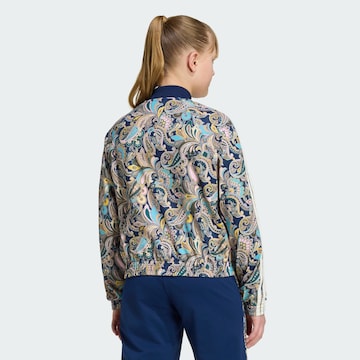 ADIDAS ORIGINALS - Chaqueta de entretiempo 'Sst' en azul