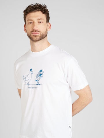 T-Shirt 'Sport Essentials Chicken' new balance en blanc