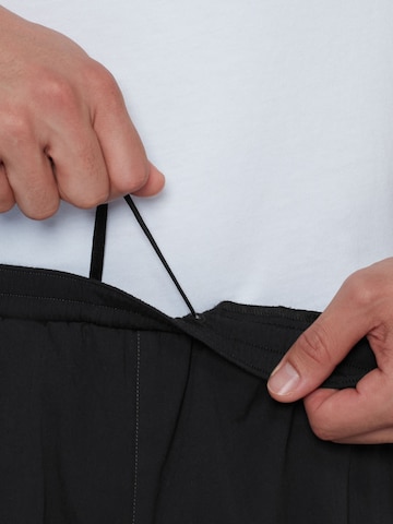 MAMMUT Regular Workout Pants in Black