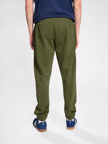Effilé Pantalon de sport 'ACTIVE' Hummel en vert