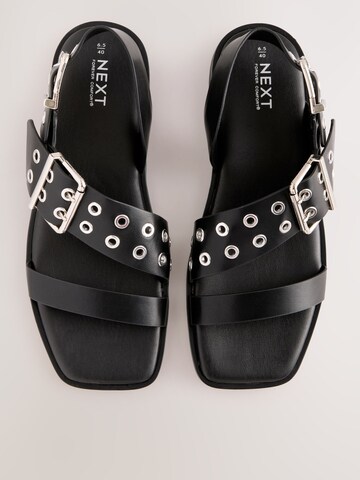 Next Remsandal i svart