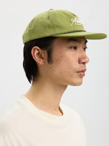 SELECTED - Gorra 'Selected x Hotel Amour' en verde