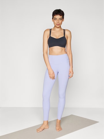 NIKE Skinny Sporthose 'ZENVY' in Lila