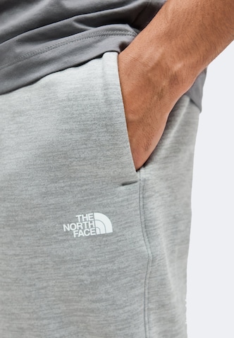 THE NORTH FACE Alt kitsenev Spordipüksid 'TNF PERFORMANCE', värv hall