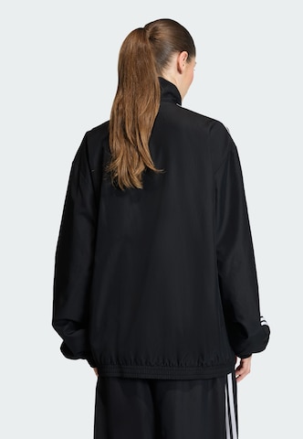 ADIDAS ORIGINALS Jacke 'Firebird Adilenium' in Schwarz