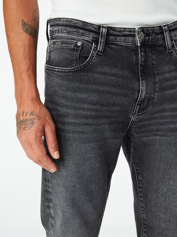 Mavi Tapered Jeans in Schwarz