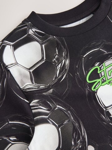 Next T-shirt i svart