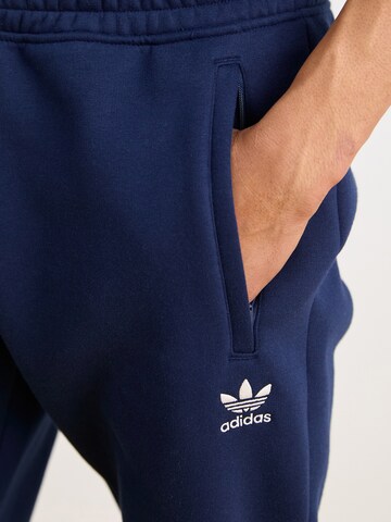 ADIDAS ORIGINALS Alt kitsenev Püksid 'Trefoil Essentials', värv sinine