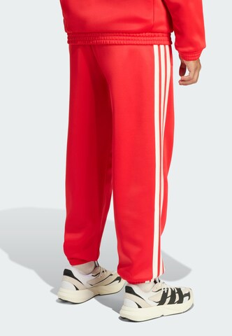 ADIDAS SPORTSWEAR Tapered Trousers in Red