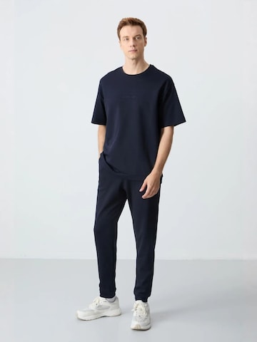 Tommy Life Huispak in Blauw: voorkant