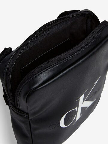 Sac à bandoulière Calvin Klein Jeans en noir