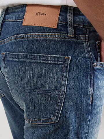 regular Jeans 'Nelio' di s.Oliver in blu