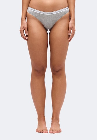 Calvin Klein Underwear Tanga – šedá: přední strana