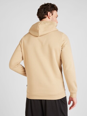 PUMA - Sweatshirt de desporto 'ESS+' em castanho